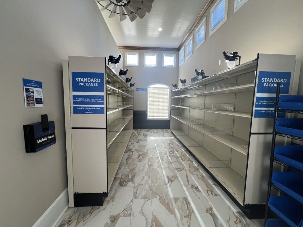 Smart Package Room system with open shelving and overhead precision-tracking modules, ready to automate package management in multifamily buildings during peak delivery seasons