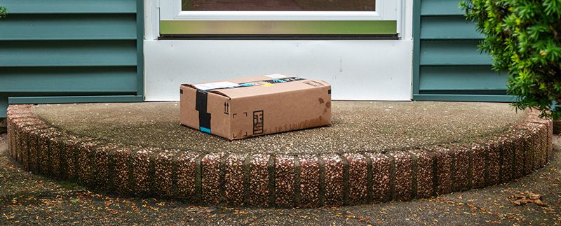 IMG_5127 Unclaimed package sitting on an apartment doorstep after a resident has moved out.