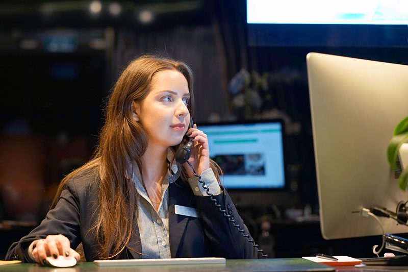 IMG_5127 Woman on the phone at desk